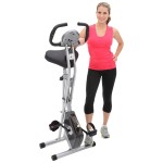 women next to Exerpeutic Folding Magnetic Upright Bike