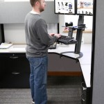 man standing at desk